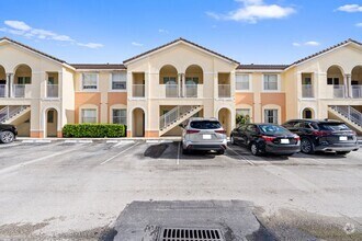 Building Photo - 2-bath condo on the 2nd floor with a newly...