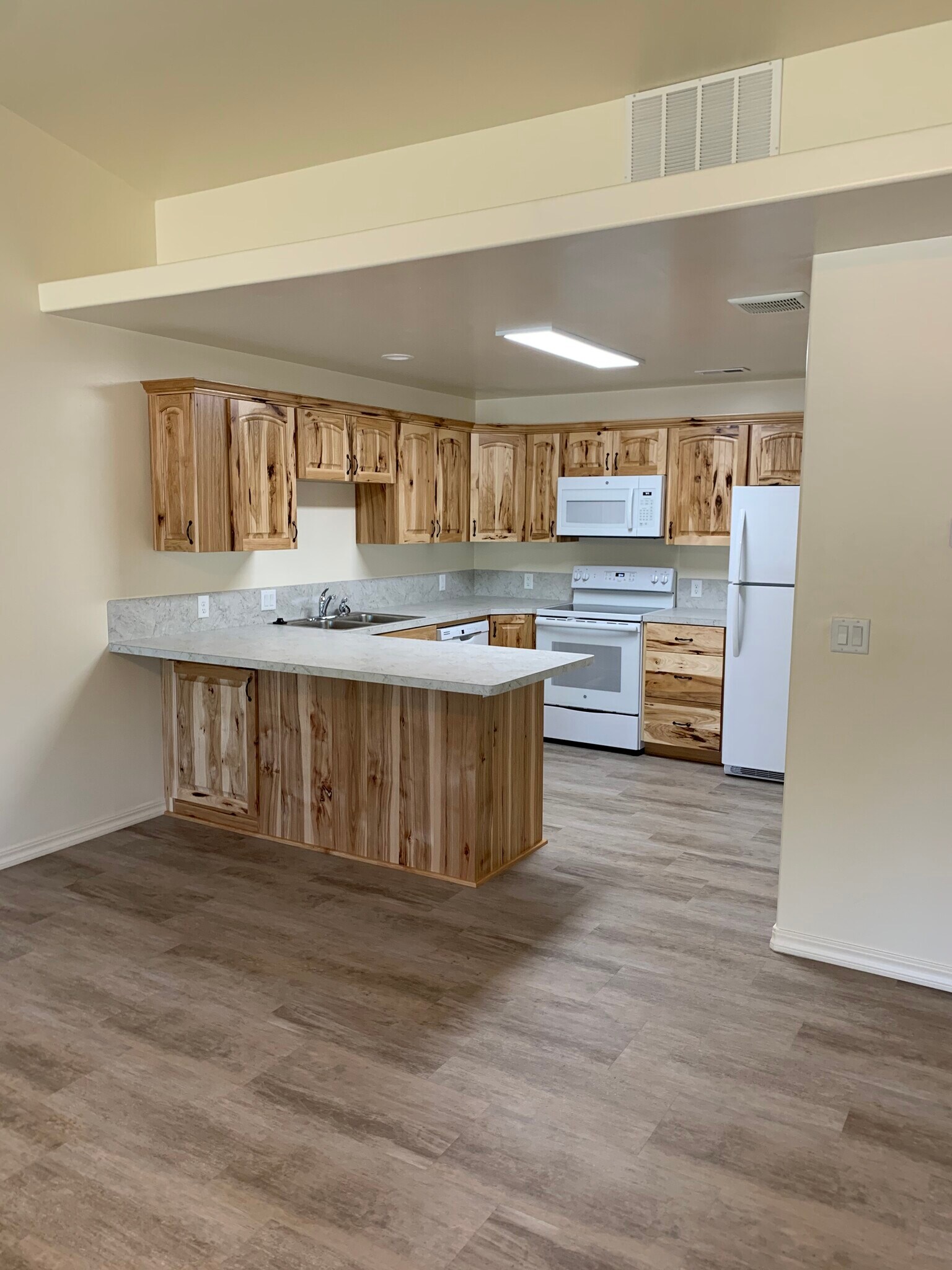 Kitchen from living room - 2100 E Olympic Ave
