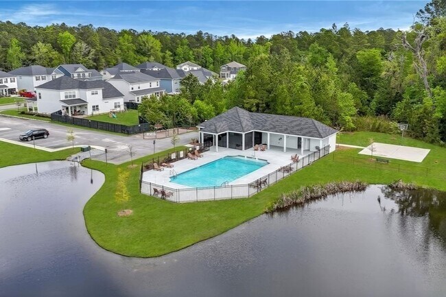 Building Photo - Highly Desirable 4 Bedroom Home with Serene Cul-de-Sac Living in Watergrass Community