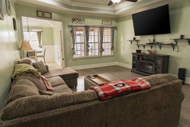 Building Photo - POOL - Elegant 4-Bedroom Home with Fenced Yard