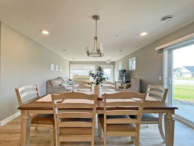 Building Photo - Spacious 2-Story End-Unit Townhome with Huge Bonus Room-Office is like Brand New!