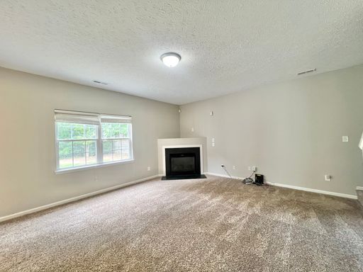 Building Photo - Charming 4BD, 2.5BA Durham Home with a Bonus Sun-Room & Fenced In Yard Only 10 Minutes Away from ...