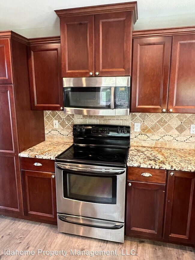 Building Photo - 4 br, 2.5 bath House - 10539 W Merab Ct