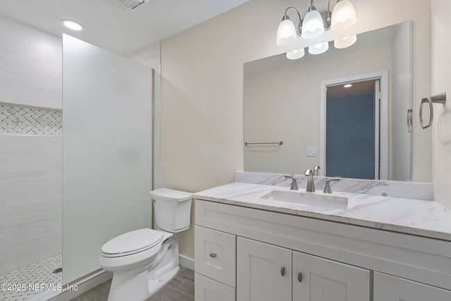 Building Photo - 9787 Sawgrass Dr E