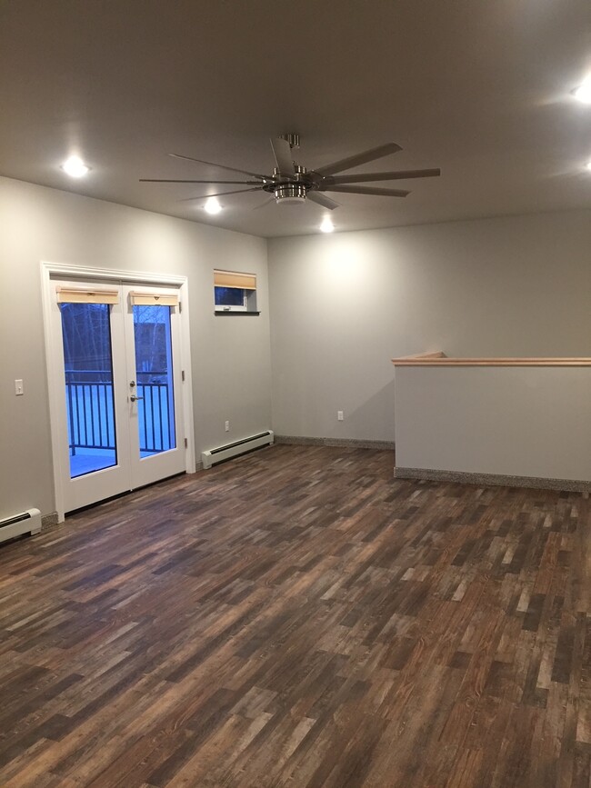 Living Room/Dining Room - 711 Ouida Way