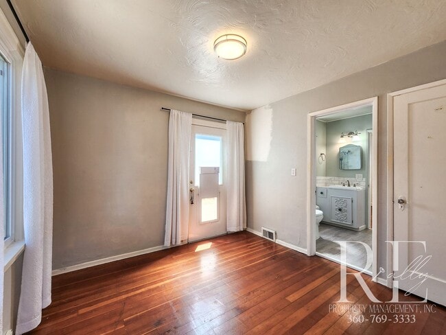 Building Photo - Classic Charmer with Water Views in the Heart of Manette