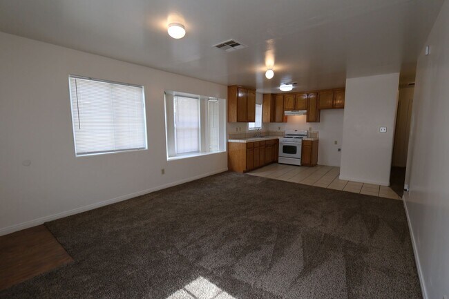 Building Photo - Spacious 3 Bedroom Duplex with Private Patio –Available! Ask About Our Move-In Special!