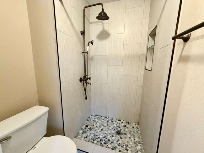 Building Photo - Modern Medical Center Gem with Stylish Upgrades & Private Patio Living