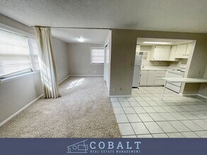 Building Photo - Studio apartment 1/2 block from campus. Available Aug 1st!