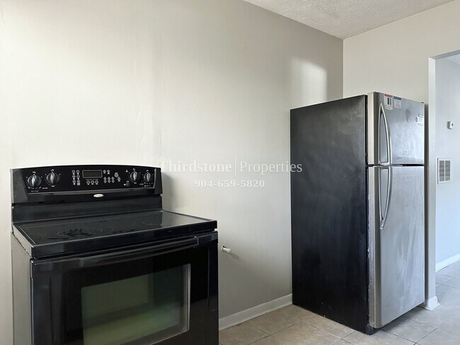 Building Photo - 2428 Miss Muffet Ln W