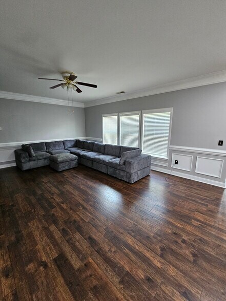 Living room with sectional - 9929 Markus Dr