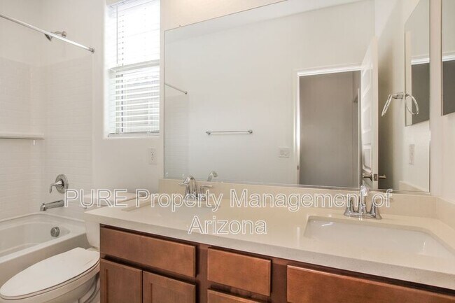 Building Photo - 3769 N 102nd Ave