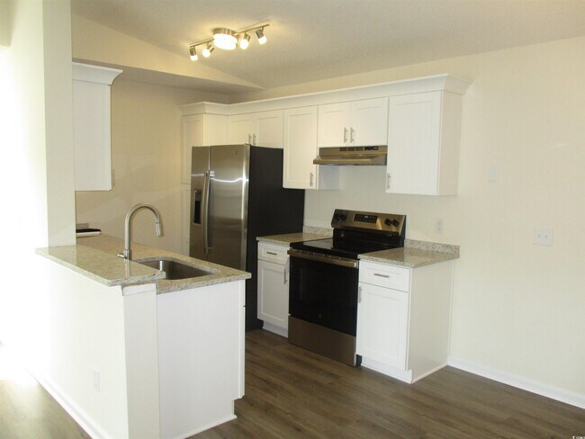 Building Photo - 8545 Hopkins Cir