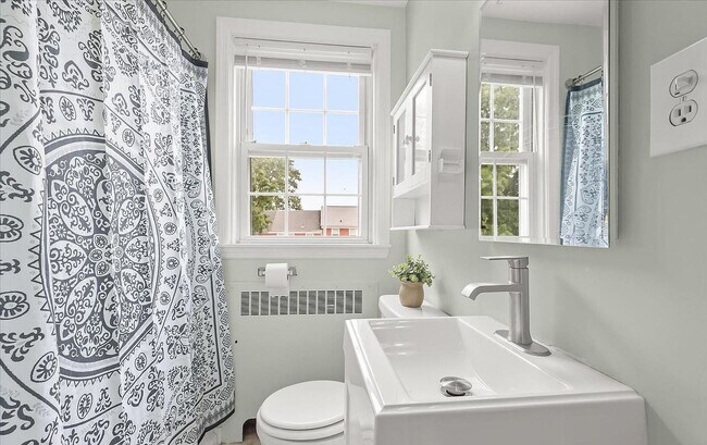 Building Photo - Updated 3BR Catonsville Townhome | Rear Parking + Deck