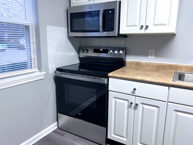 Electric Range and Microwave - Waterglen Apartments