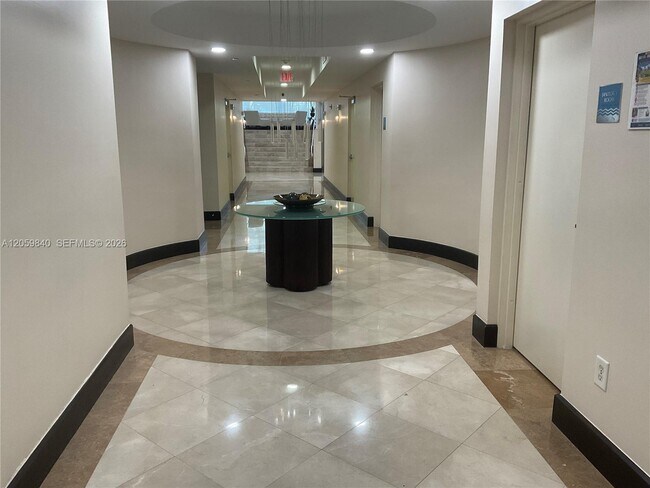 Building Photo - 7600 Collins Ave