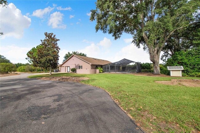 Building Photo - 7740 Lake Hatchineha Rd
