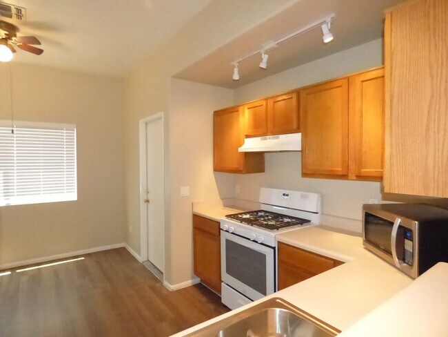 Building Photo - New paint and plank flooring.....convenien...