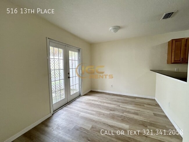 Building Photo - 516 13th Pl