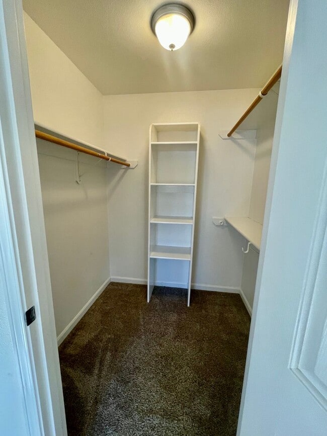 Building Photo - Ranch style 3bedroom/2 bathroom with an Oversized two car garage +giant carport!  Large private l...