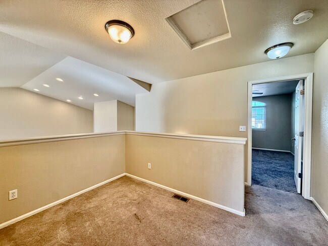 Building Photo - Spacious 4-Bedroom Home with Main level Li...