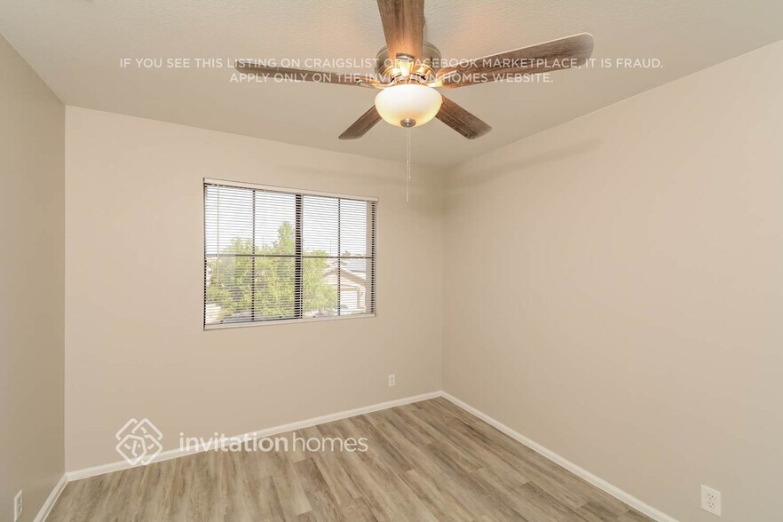 Building Photo - 8793 W Laurel Ln
