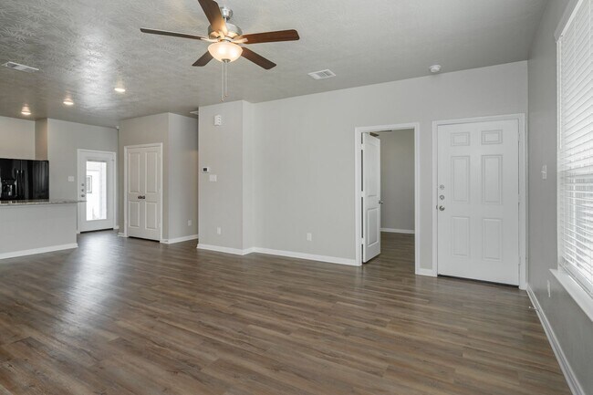 Building Photo - Live, love, and grow in this charming townhome!