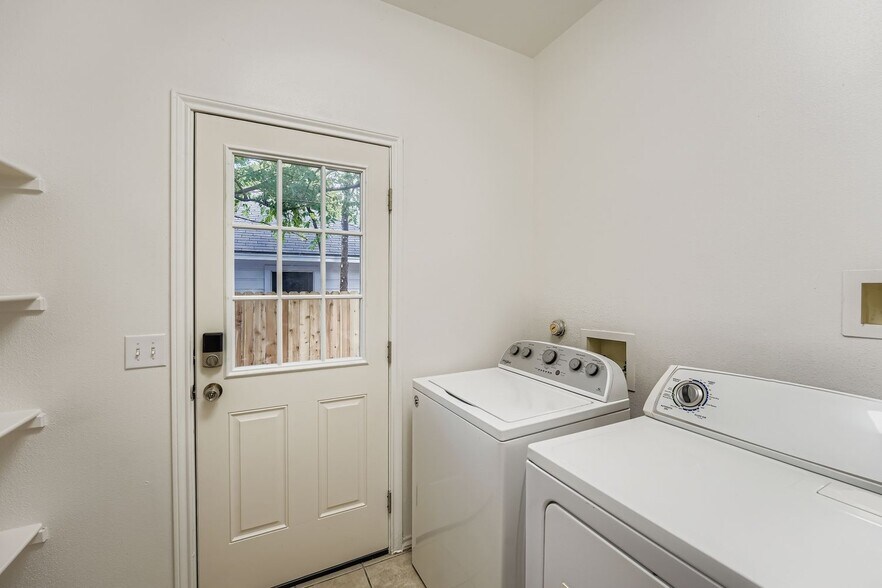 Downstairs laundry area (off kitchen) - 7207 Bethune
