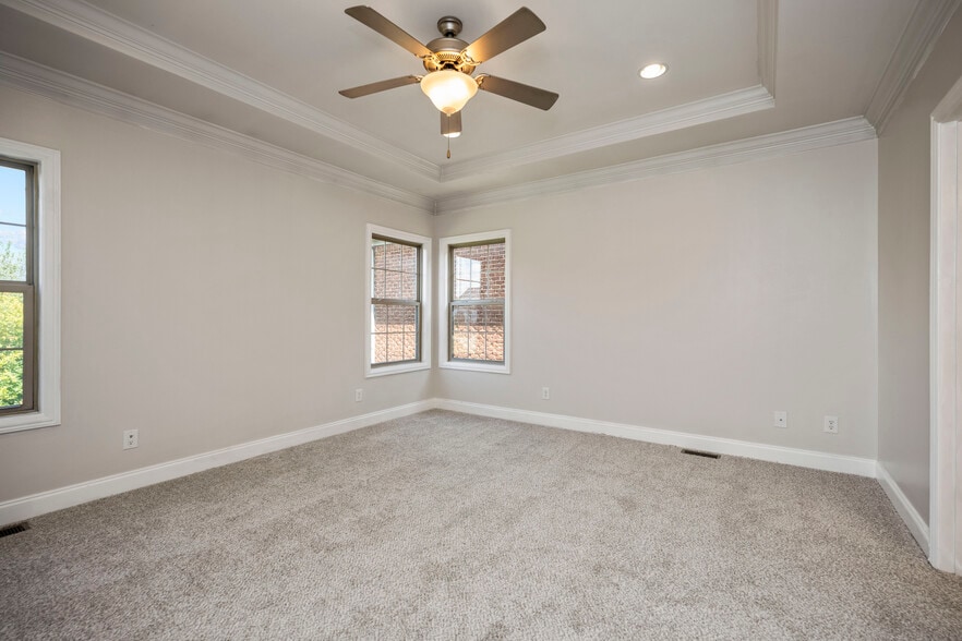 First Floor Primary Bedroom (14x12) overlooking beautiful Greenspaces - 393 Hays Blvd
