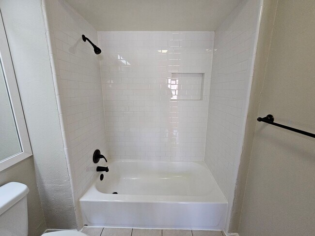 Building Photo - Stunning two-level, two-bedroom, one-and-a-half-bathroom townhome