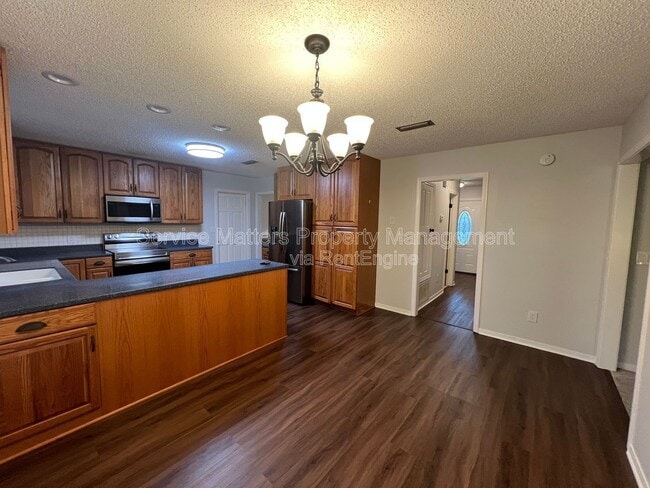 Building Photo - 6004 Players Pl