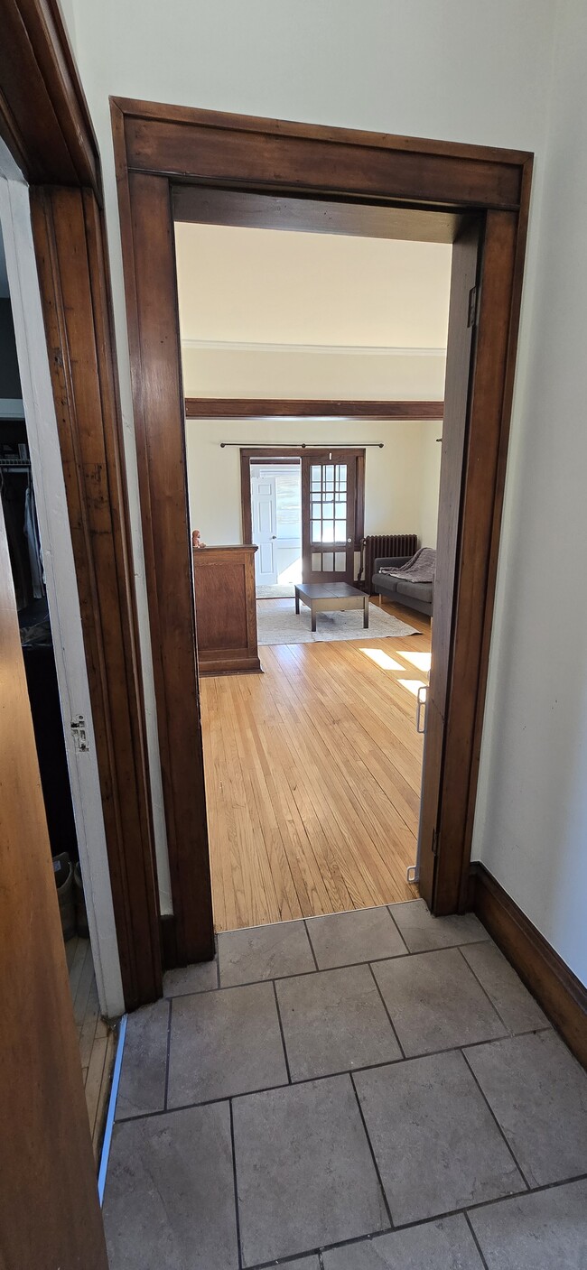 Looking from hallway into dining and living rooms. - 533 Smith Ave S