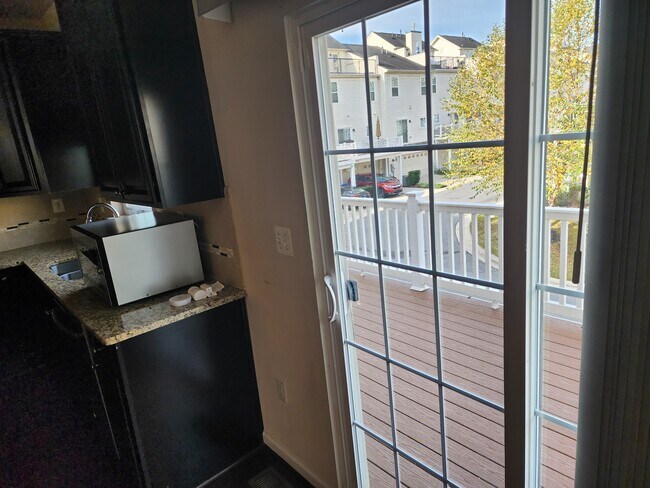 Deck attached to Kitchen - 7013 Southmoor St