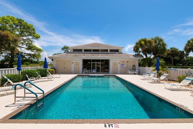 Building Photo - GORGEOUS 2 BEDROOM, 2 BATHROOM 1ST FLOOR CONDO LOCATED IN THE HIGHLY SOUGHT AFTER TENTH FAIRWAY A...