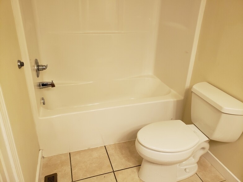 Full bathroom with tub and shower - 2977 West Village Lane