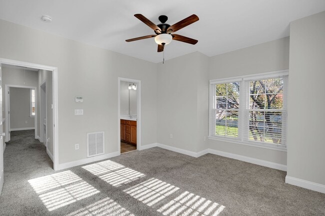 Building Photo - Wonderful craftsman style end-unit townhome