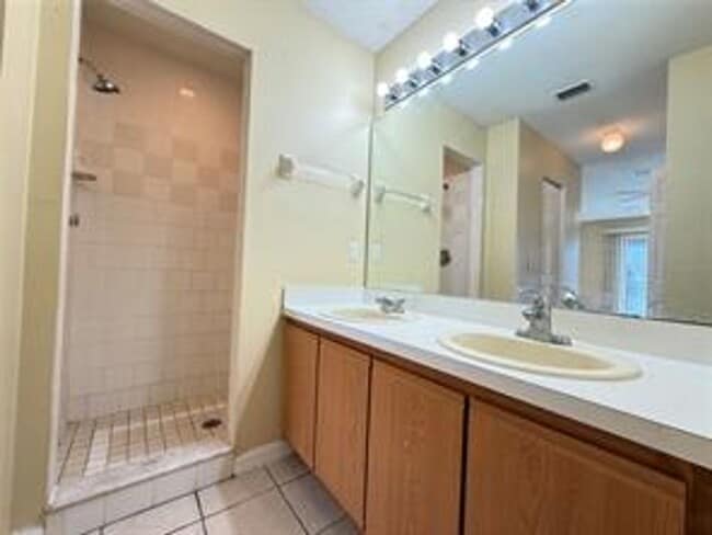 Building Photo - Charming 3-bed, 2-bath POOL home with 2-car garage. Features ceramic tile flooring, updated kitch...