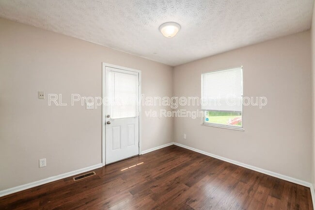 Building Photo - 7179 Feather Ct