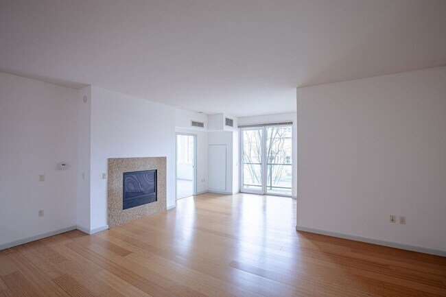 Building Photo - Sweet + secure 1/1 condo with parking, extra storage room + AC available now!