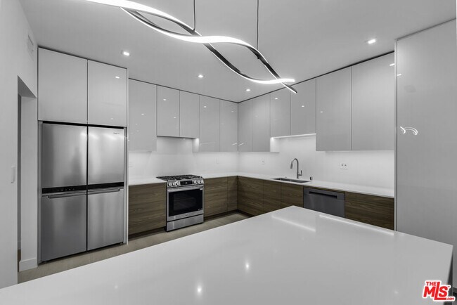 Building Photo - 10630 Wilkins Ave