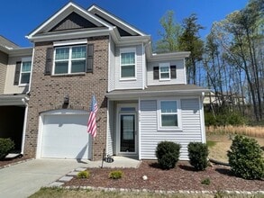 Building Photo - MOVE IN READY! Amazing end-unit townhome