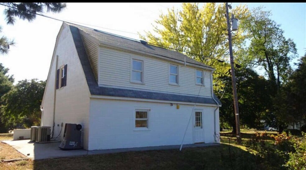 Door for shared washer and dryer down stairs - 102 Loch Lane Dr