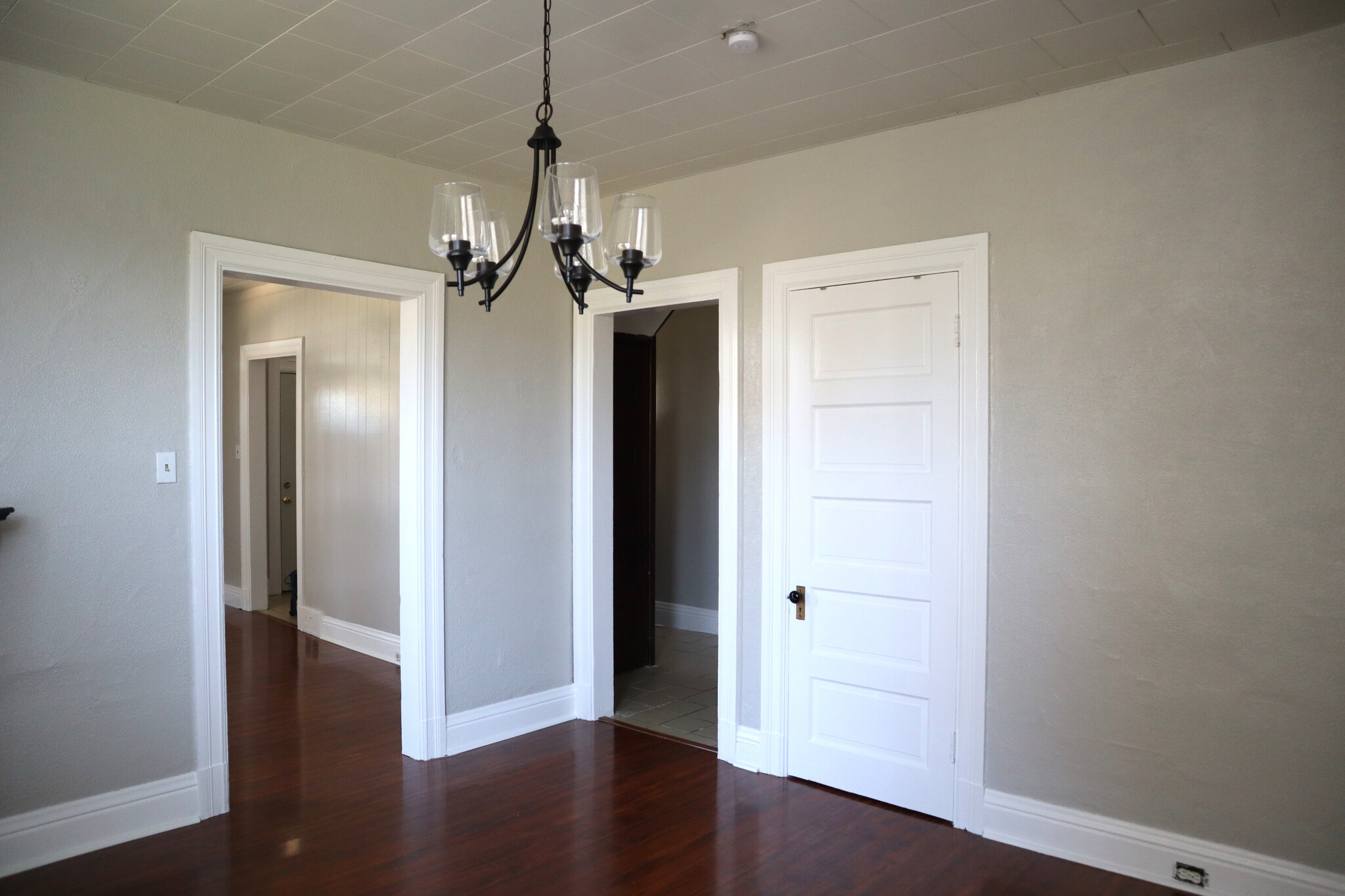 The left doorframe leads to the living room, the right door frame leads to the hallway and full bath - 715 Clinton Pl