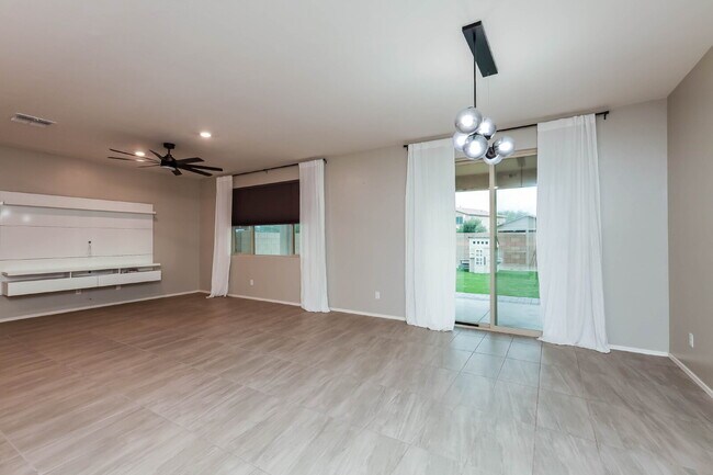 Building Photo - "Spacious 4-Bed Spacious two-level residential rental in Marana with modern Elegance!  Available ...