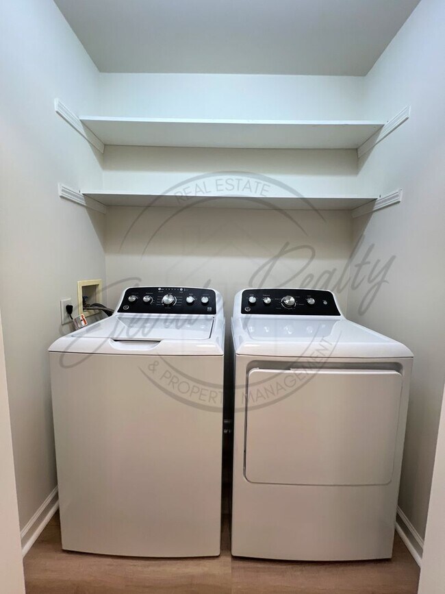 Building Photo - SPECIAL: FIRST MONTHS RENT FREE! Two Bedro...