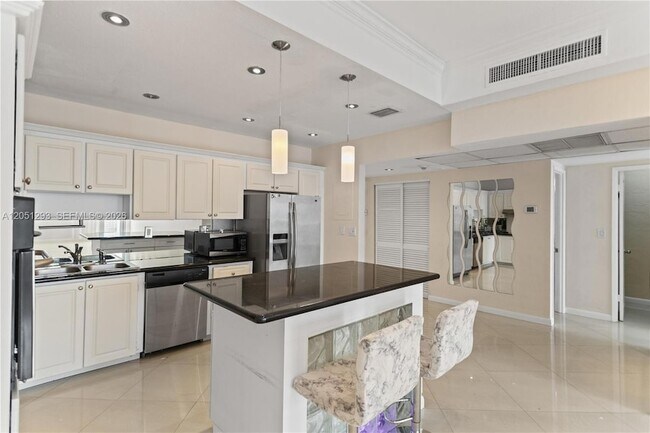 Building Photo - 19390 Collins Ave