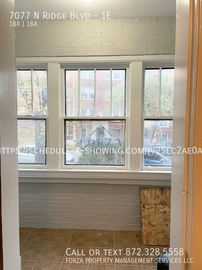 Building Photo - 7077 N Ridge Blvd