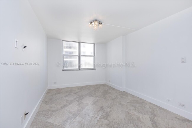 Building Photo - 6039 Collins Ave