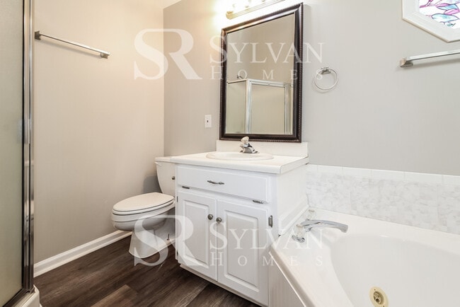 Building Photo - This lovely home is ready for your personal touch!