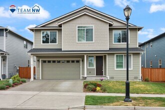 Building Photo - Community beach access! 4 bedrooms 2.5 baths.